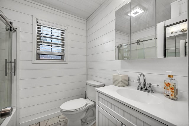 bathroom featuring toilet, vanity, a shower with door, and wooden walls