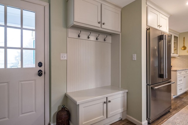 mudroom with dark wood-type flooring