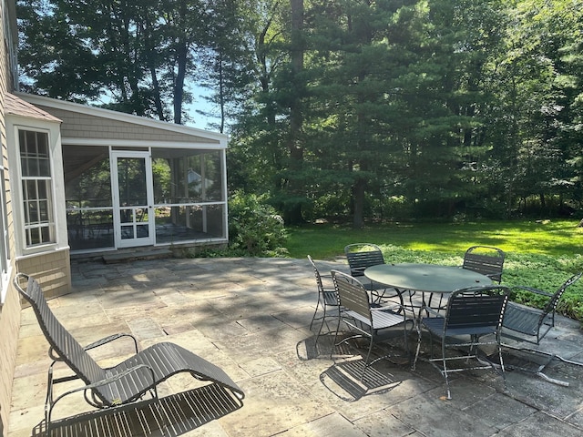 125 Silver Spring Rd, Fairfield, CT 06824 - view of patio / terrace with a sunroom and outdoor dining area