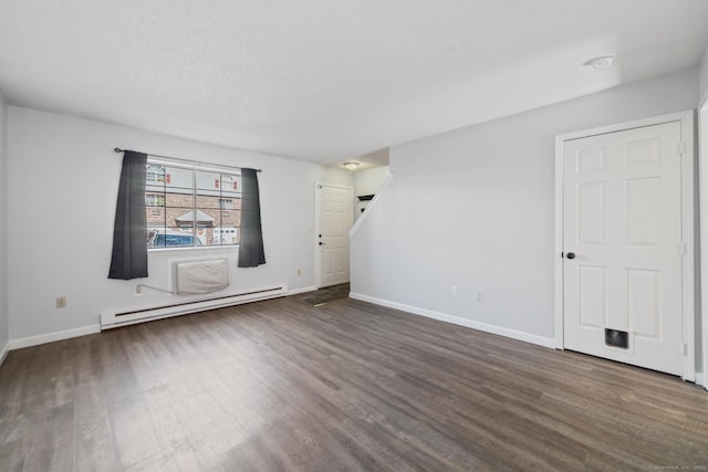 unfurnished room featuring dark wood-style flooring, a baseboard radiator, and baseboards