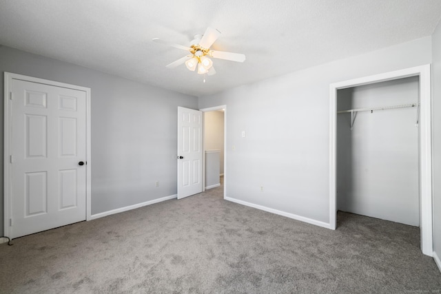unfurnished bedroom with a closet, ceiling fan, and carpet