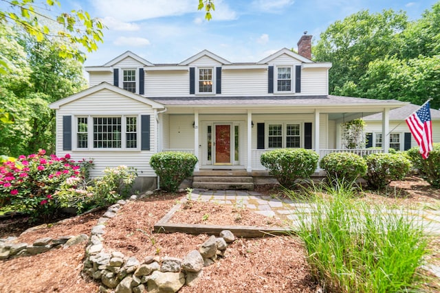 20 Tolland Farms Rd, Tolland, CT 06084 - view of front facade with a chimney and a porch