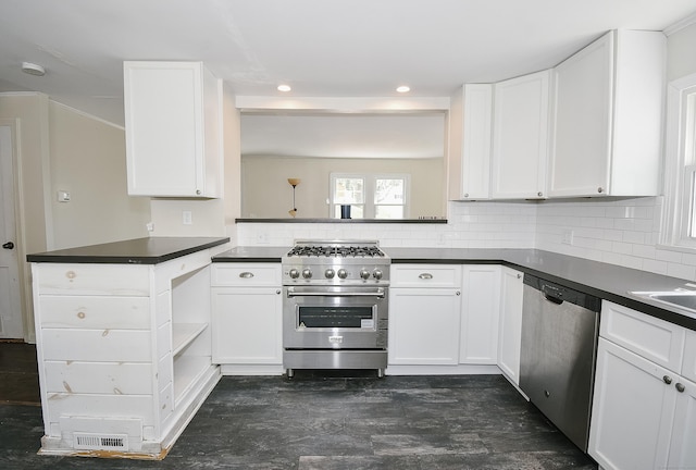 kitchen featuring backsplash, dark countertops, open shelves, white cabinets, and stainless steel appliances