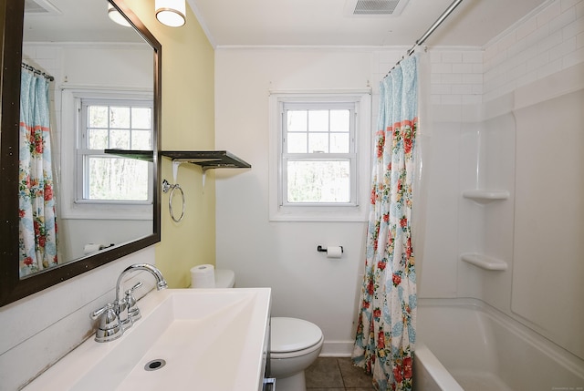 bathroom featuring visible vents, tile patterned floors, a wealth of natural light, and toilet