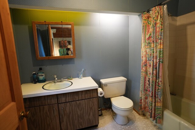 953 Rainbow Trl, Orange, CT 06477 - bathroom featuring toilet, tile patterned flooring, vanity, and shower / bathtub combination with curtain