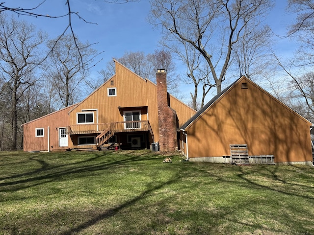 953 Rainbow Trl, Orange, CT 06477 - rear view of property featuring a chimney, stairs, a lawn, and a wooden deck