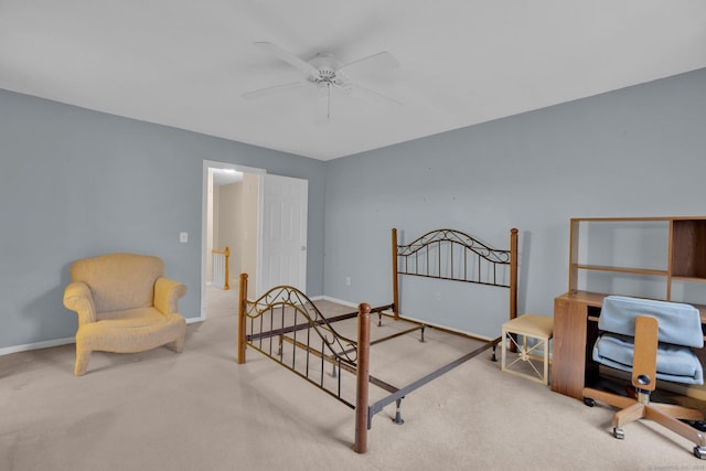 carpeted bedroom with baseboards