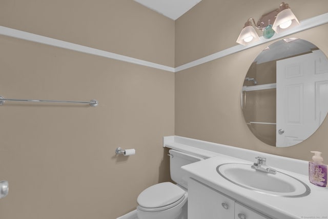 bathroom with an enclosed shower, toilet, and vanity