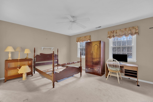 bedroom with visible vents, baseboards, a ceiling fan, and carpet flooring