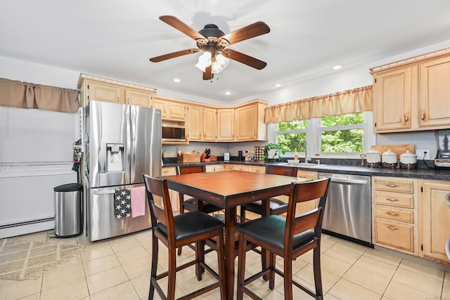 17 Straitsville Rd, Prospect, CT 06712 - kitchen with stainless steel appliances, light brown cabinets, light tile patterned floors, a baseboard radiator, and a sink