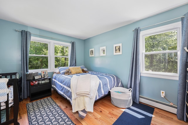 17 Straitsville Rd, Prospect, CT 06712 - bedroom with baseboard heating and wood finished floors