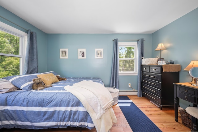 17 Straitsville Rd, Prospect, CT 06712 - bedroom featuring a baseboard radiator and light wood-style floors