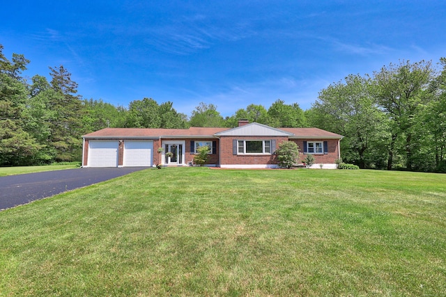17 Straitsville Rd, Prospect, CT 06712 - ranch-style home featuring asphalt driveway, brick siding, an attached garage, and a front yard