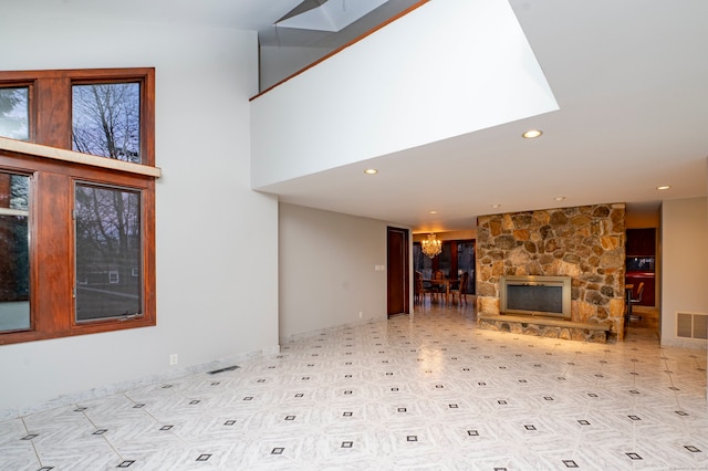 41 Seeley Rd, Trumbull, CT 06611 - unfurnished living room with recessed lighting, a fireplace, and a chandelier