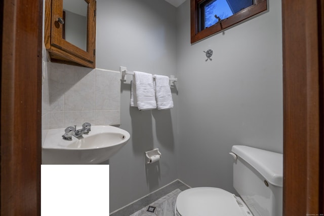 41 Seeley Rd, Trumbull, CT 06611 - half bath with toilet and decorative backsplash