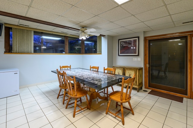 41 Seeley Rd, Trumbull, CT 06611 - dining room featuring a paneled ceiling, a ceiling fan, and light tile patterned flooring