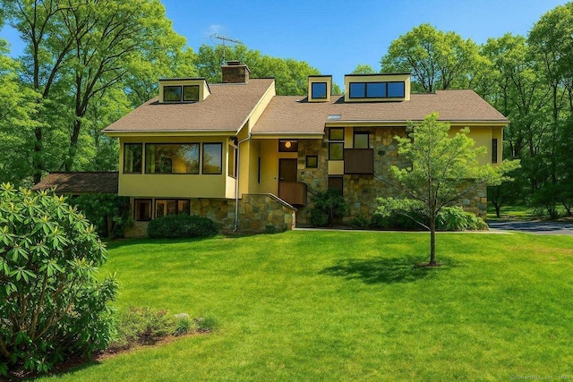 41 Seeley Rd, Trumbull, CT 06611 - view of front of property featuring stone siding, a front yard, and a chimney