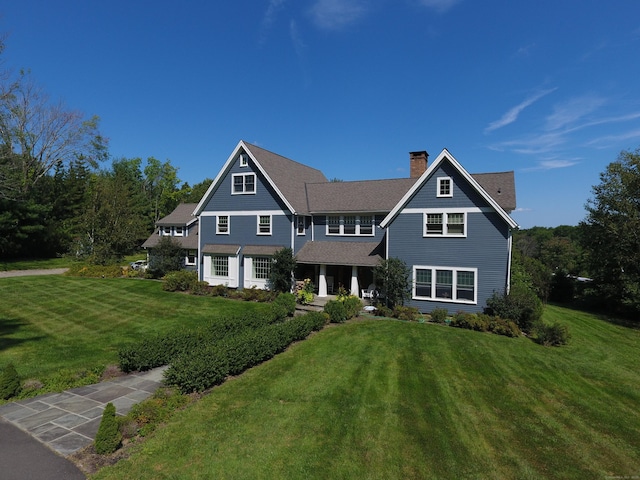 65 Joes Hill Rd, Danbury, CT 06811 - shingle-style home featuring a chimney, a front yard, and covered porch