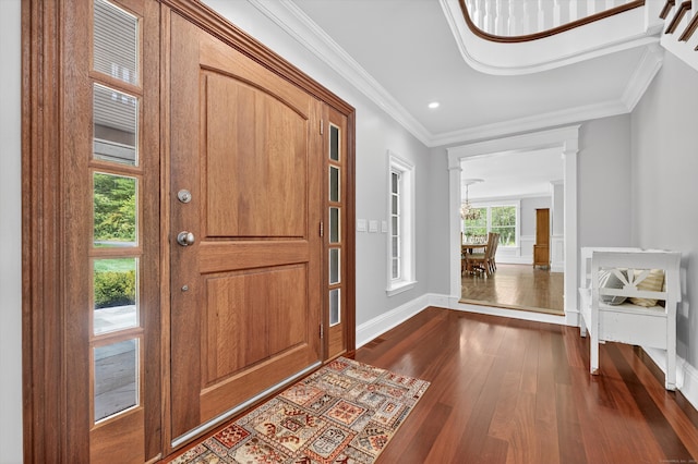 65 Joes Hill Rd, Danbury, CT 06811 - foyer entrance with dark wood-style flooring, ornamental molding, decorative columns, and recessed lighting