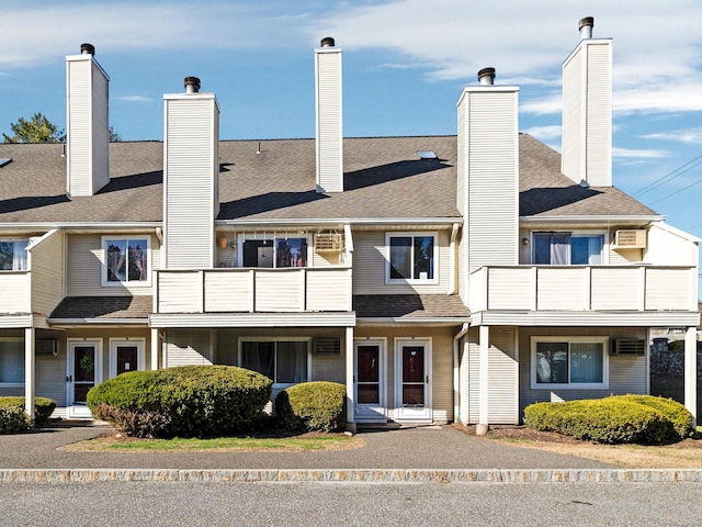 view of front of property with a balcony