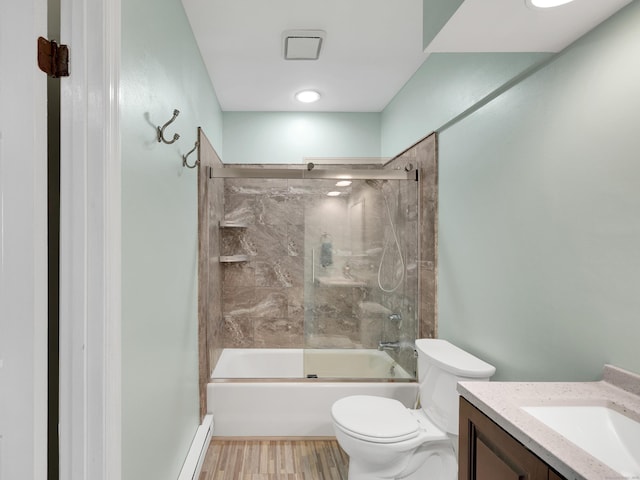 full bath with combined bath / shower with glass door, toilet, wood finished floors, vanity, and a baseboard heating unit