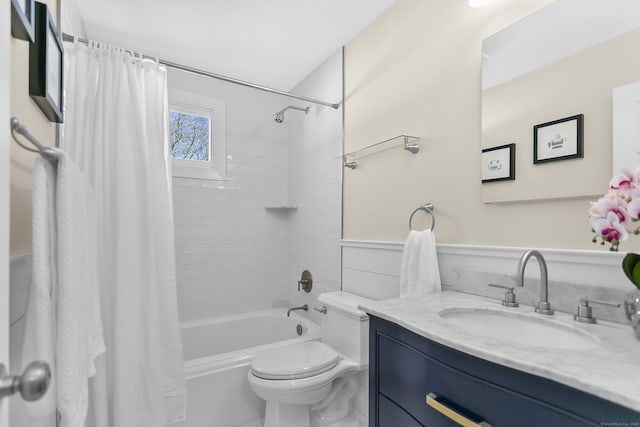 full bathroom with toilet, vanity, and shower / bathtub combination with curtain
