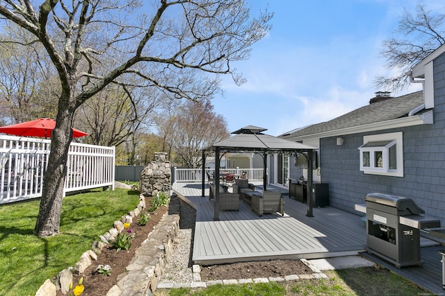 deck with a yard, a gazebo, fence, outdoor lounge area, and grilling area