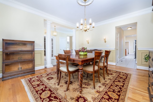 2 Pennington Dr Unit 2, Simsbury, CT 06070 - dining space with a chandelier, ornamental molding, wainscoting, and light wood-style floors