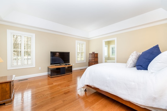 2 Pennington Dr Unit 2, Simsbury, CT 06070 - bedroom with a raised ceiling, wood finished floors, multiple windows, and crown molding