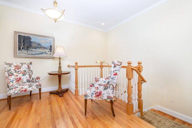 2 Pennington Dr Unit 2, Simsbury, CT 06070 - sitting room with baseboards, wood finished floors, crown molding, recessed lighting, and an upstairs landing