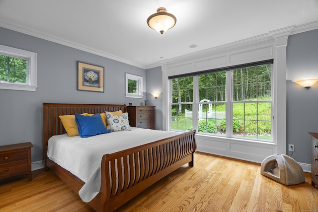 301 Fox Hopyard Rd, East Haddam, CT 06423 - bedroom featuring wood finished floors and ornamental molding