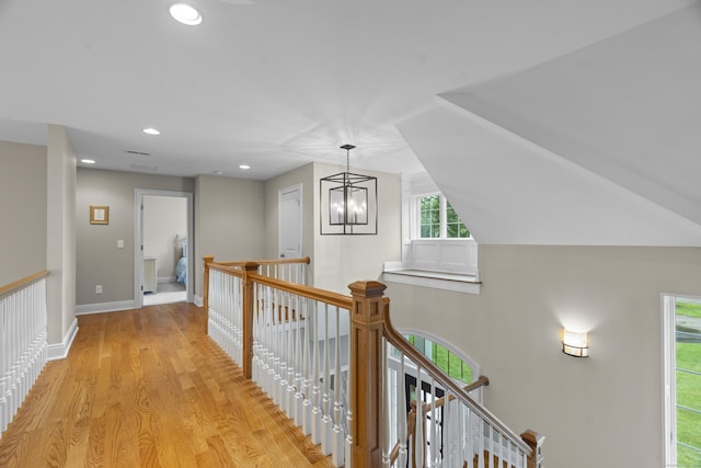 301 Fox Hopyard Rd, East Haddam, CT 06423 - hall featuring an upstairs landing, light wood-style flooring, a chandelier, and recessed lighting