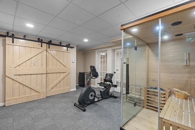 301 Fox Hopyard Rd, East Haddam, CT 06423 - exercise area with a barn door and recessed lighting