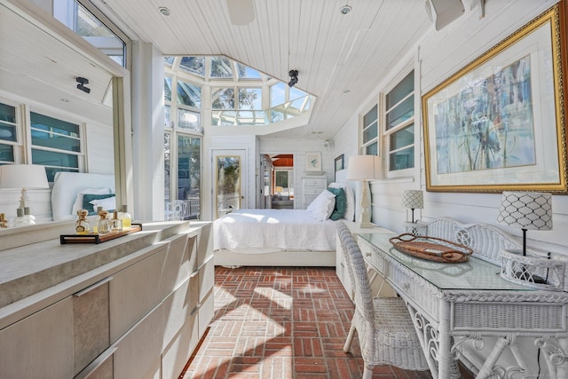 7 Ford Rd, Newtown, CT 06482 - bedroom with brick floors, wood ceiling, a high ceiling, and a skylight