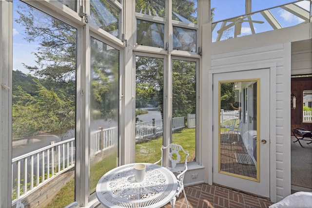 7 Ford Rd, Newtown, CT 06482 - sunroom with brick floors and a water view