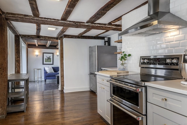 119 Town Hill Rd, Warren, CT 06754 - kitchen featuring stainless steel appliances, wall chimney exhaust hood, decorative backsplash, dark wood finished floors, and baseboards