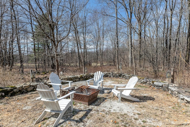 view of yard featuring a fire pit