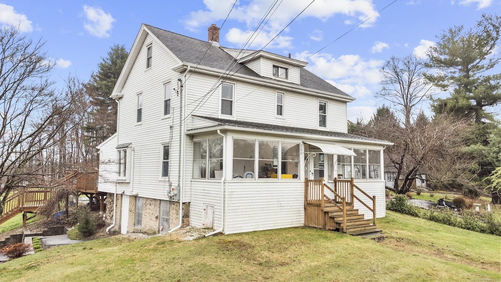 200 Middletown Rd, Berlin, CT 06037 - view of front of home featuring a front yard, a shingled roof, a sunroom, a chimney, and stairs