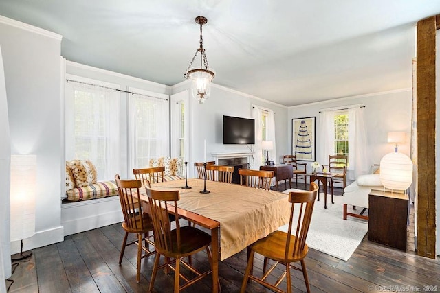 253 Tophet Rd, Roxbury, CT 06783 - dining space with dark wood-type flooring, ornamental molding, and a fireplace