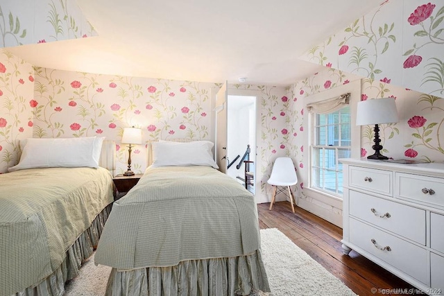 253 Tophet Rd, Roxbury, CT 06783 - bedroom with wallpapered walls and wood finished floors