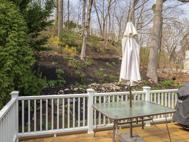 deck featuring outdoor dining area