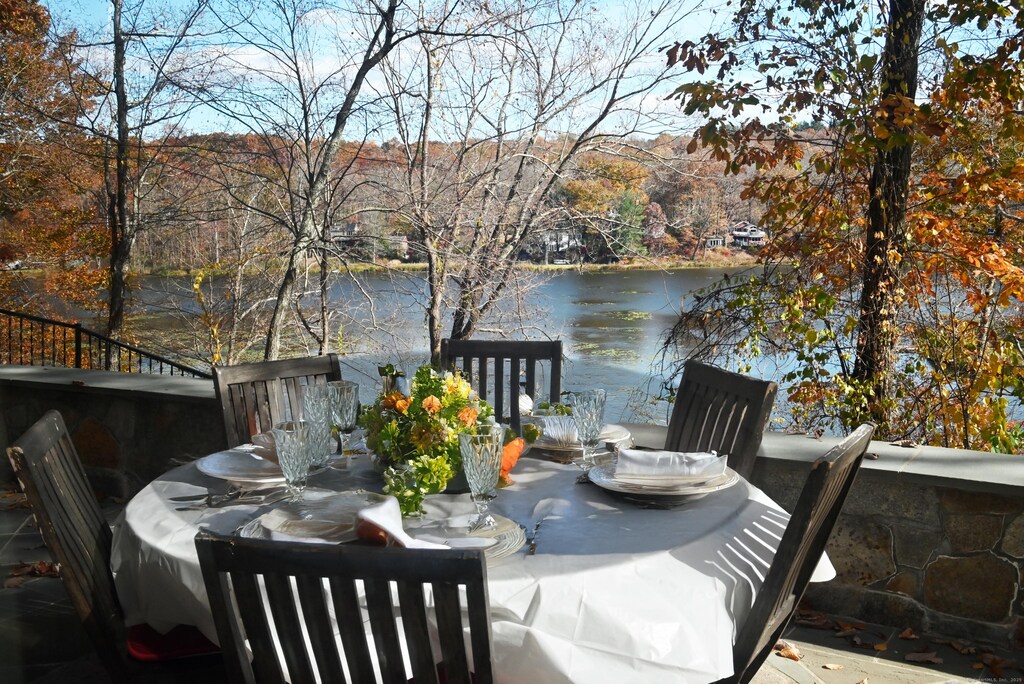6 Waters Edge Way, Ridgefield, CT 06877 - wooden terrace with a water view