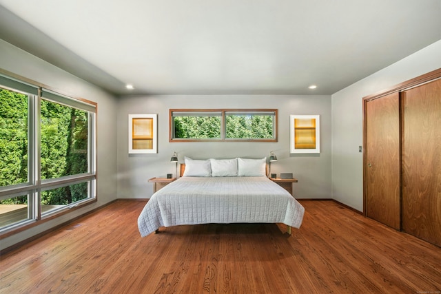 71 Boulderol Rd, Stamford, CT 06903 - bedroom with wood finished floors, recessed lighting, and a closet