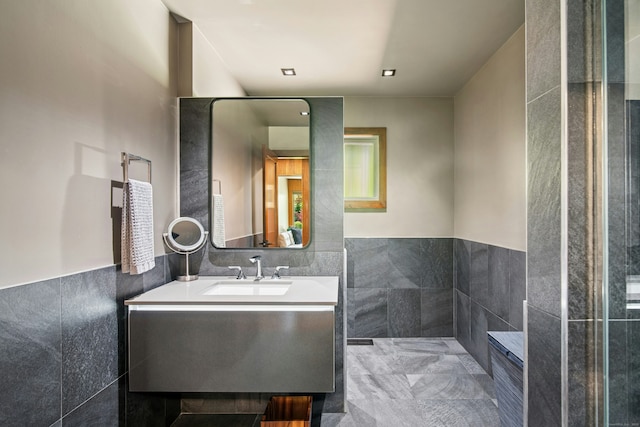71 Boulderol Rd, Stamford, CT 06903 - bathroom featuring tile walls and vanity