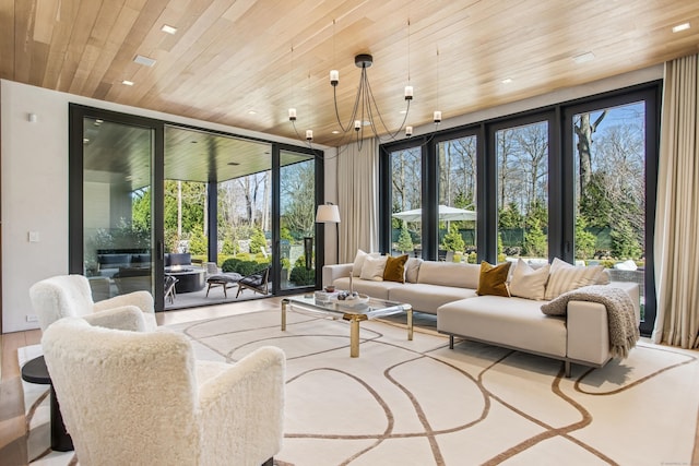 living room featuring wood ceiling, plenty of natural light, floor to ceiling windows, and recessed lighting