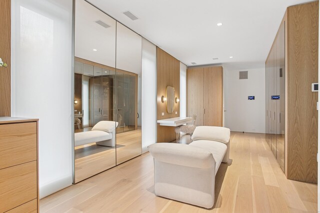 sitting room with light wood-type flooring