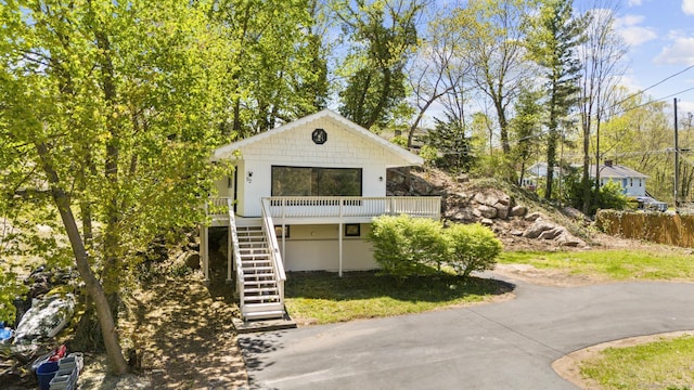 view of front of property with stairs