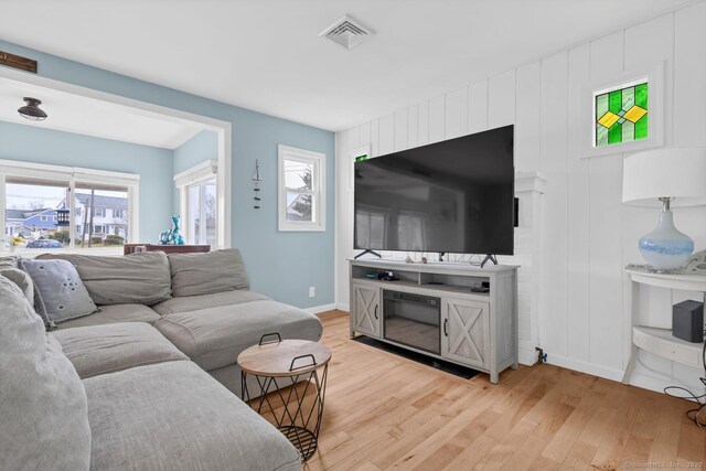 37 Woodland Dr, Old Saybrook, CT 06475 - living area with light wood finished floors and baseboards