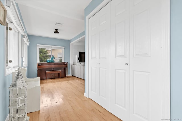 37 Woodland Dr, Old Saybrook, CT 06475 - hallway featuring light wood-style flooring and baseboards