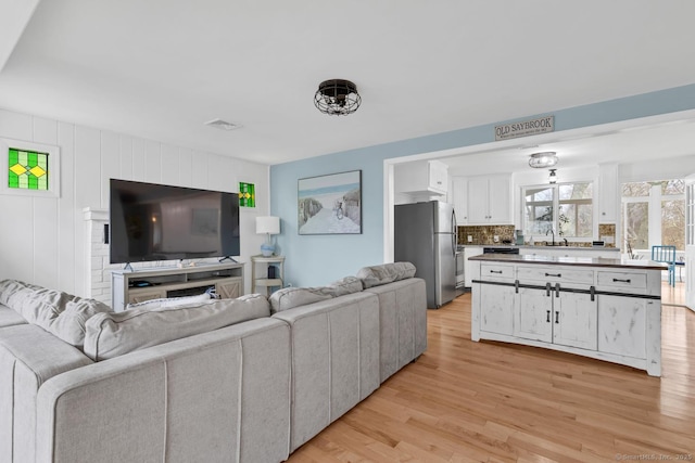 37 Woodland Dr, Old Saybrook, CT 06475 - living area with light wood finished floors